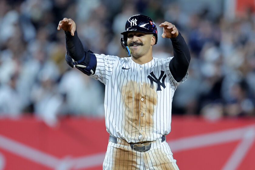 Oct 1, 2025; Bronx, New York, USA; New York Yankees center fielder Trent Grisham (12) celebrates his double against the Boston Red Sox during the seventh inning of game two of the Wildcard round of the 2025 MLB playoffs at Yankee Stadium. Mandatory Credit: Brad Penner-Imagn Images